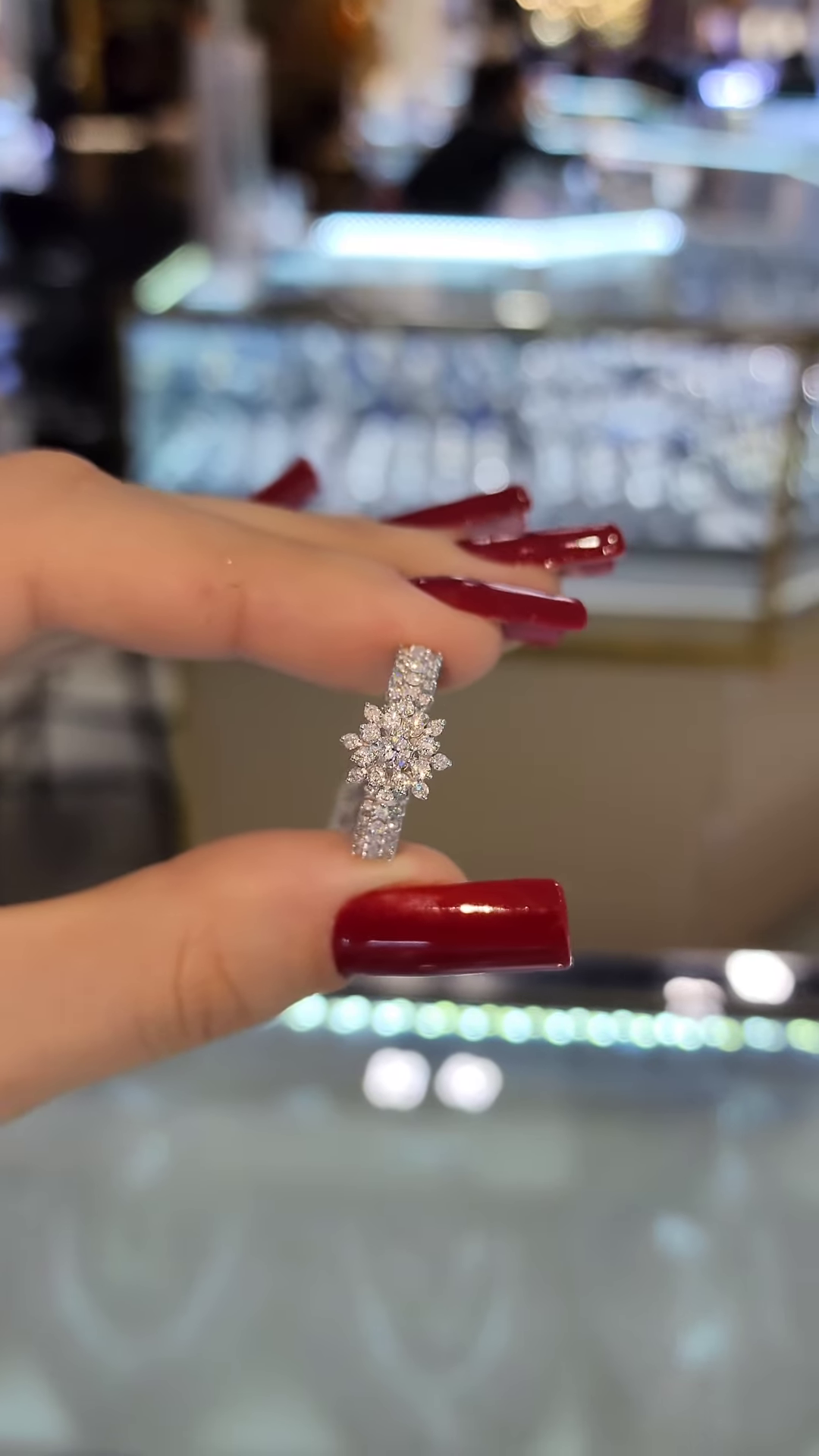 Dazzling Floral Halo Engagement Ring with Pave Band