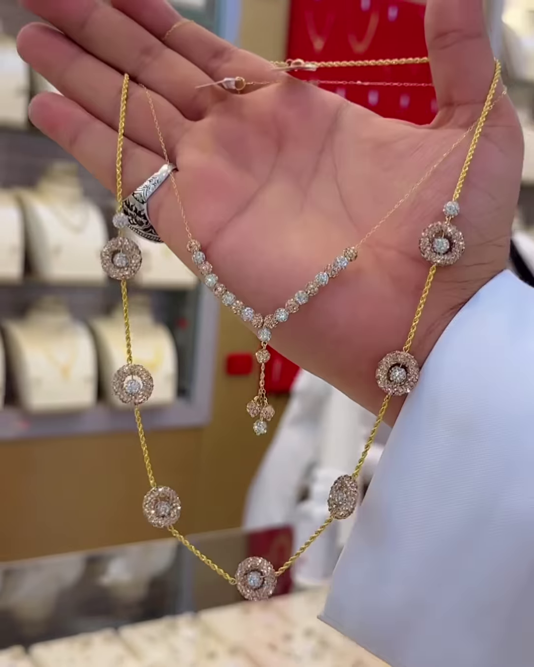 Elegant Two-Tone Gold Necklace with Diamond-Accented Floral Motifs