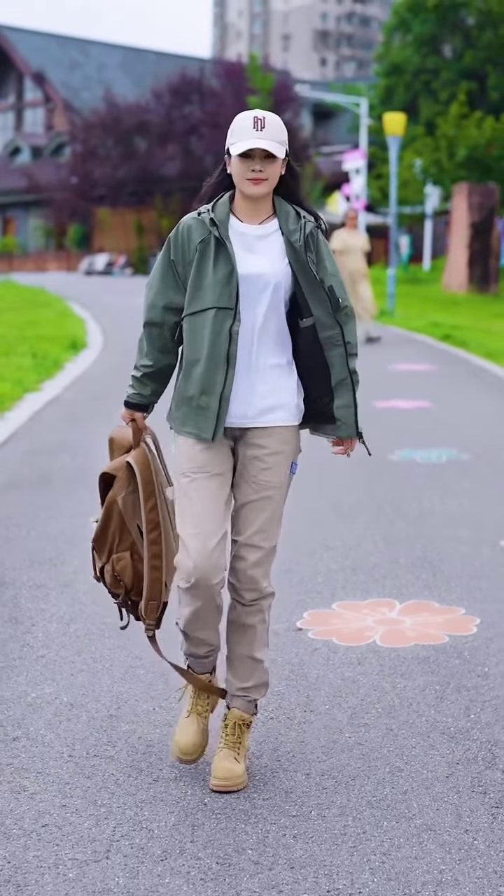 Green Zip-Up Casual Jacket 🧥🌳 – Styled with White Tee & Beige Cargo Pants in Outdoor Setting