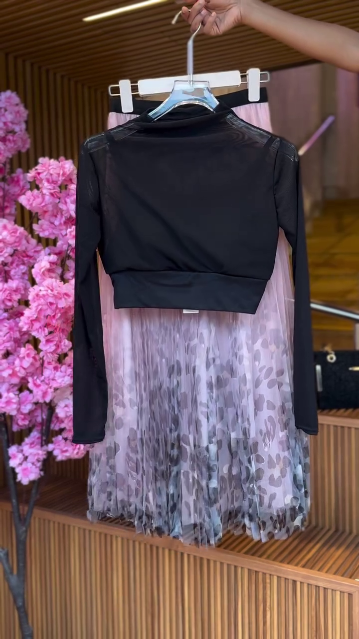 Sheer Sleeve Crop Top in Black & Abstract Pleated Skirt