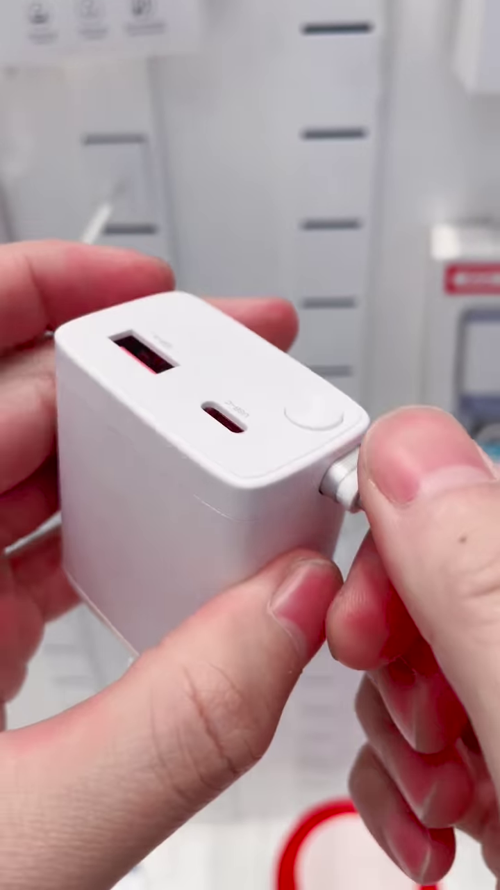 Universal Dual-Port Fast Wall Charger with Integrated Retractable Charging Cable & Compact Travel Design