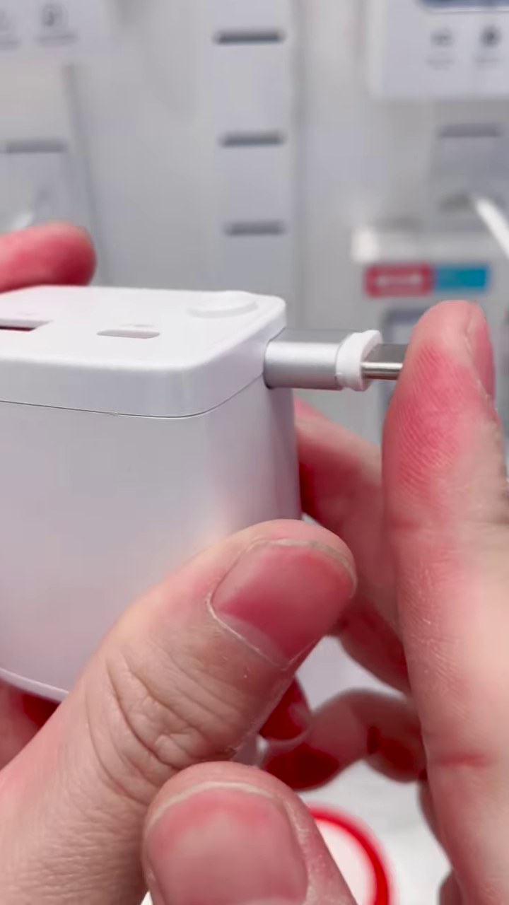 Universal Dual-Port Fast Wall Charger with Integrated Retractable Charging Cable & Compact Travel Design