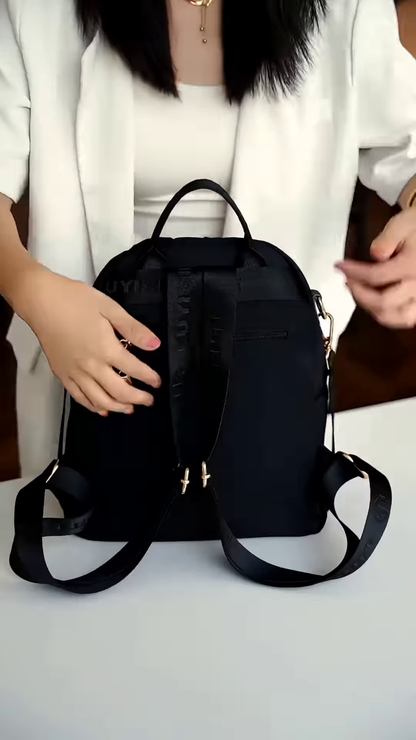 Elegant Water-Resistant Fashion Backpack for Women with Multi-Compartment Storage and Luxury Gold-Tone Accents