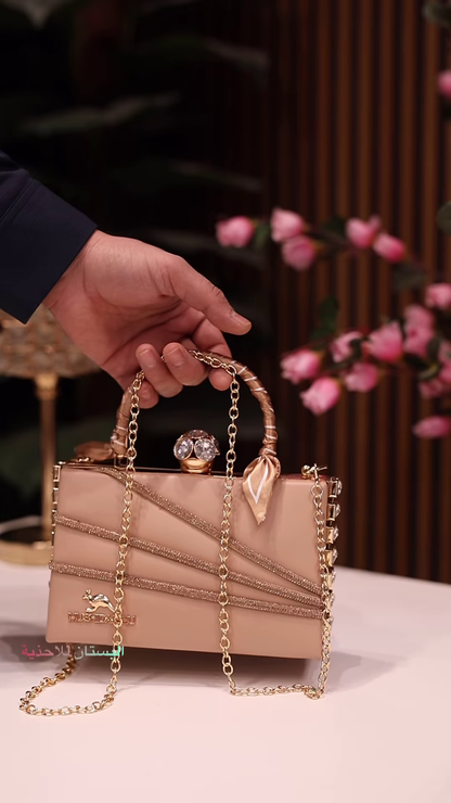 Elegant Ivory Clutch with Rhinestone Embellishments and Chain Strap