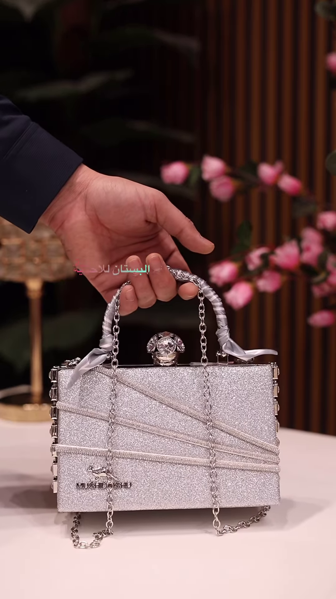 Elegant Ivory Clutch with Rhinestone Embellishments and Chain Strap