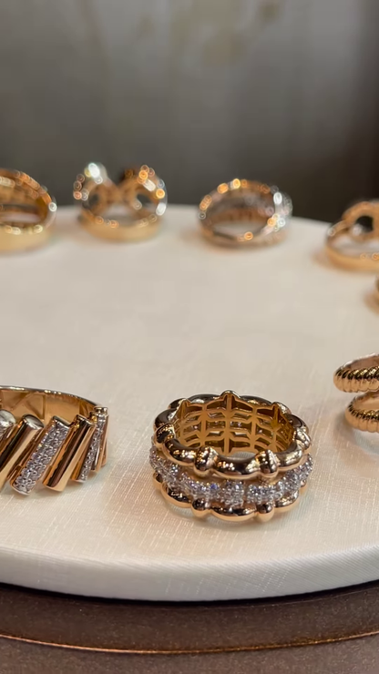 Chic Gold-Toned Ring Stack with Pavé, Textured, and Chain Link Designs
